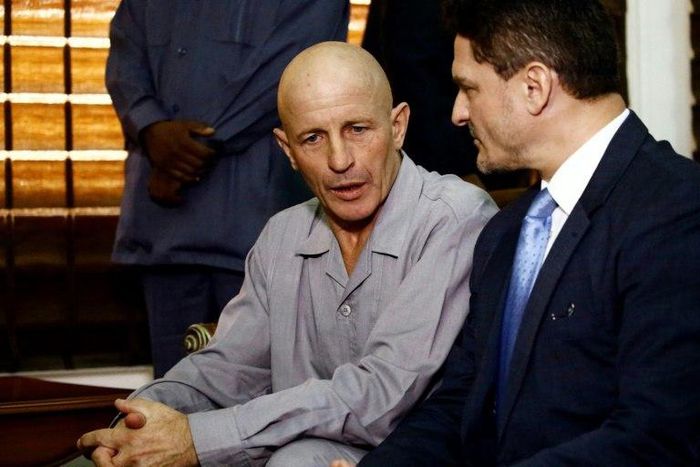 Frenchman Thierry Frezier who was kidnapped in Chad on March 23 speaks with French charge d'affaires in Khartoum Christian Bec on May 7, 2017, after being freed