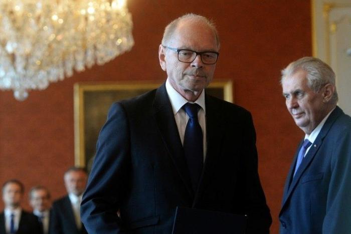 New Czech Minister of Finance, Ivan Pilny from the ANO party, leaves after having been appointed by President Milos Zeman (R) on May 24, 2017 at the Hradcany Castle in Prague