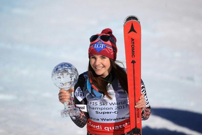 Tina Weirather of Liechtenstein smiles with the globe for winning the overall title for the ladies' Super-G following the ladies' Super-G during the Audi FIS Ski World Cup Finals at Aspen Mountain on March 16, 2017 in Aspen, Colorado