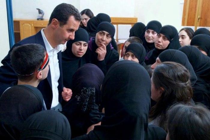 Syrian President Bashar al-Assad said it was the "duty of any government" to regain control of "every inch" of its territory