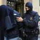 Two men arrested in Spain during a joint investigation between Spanish and Belgian police, admitted being at Brussels airport at the time of a deadly 2016 attack