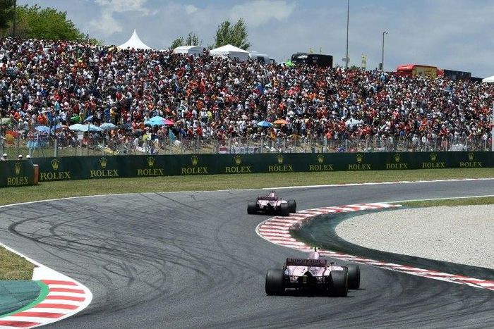 Force India's French driver Esteban Ocon (L) and Force India's Mexican driver Sergio Perez race at the Circuit de Catalunya on May 14, 2017 in Montmelo on the outskirts of Barcelona during the Spanish Formula One Grand Prix