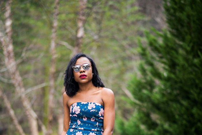 Titilola Sogunro sports a floral bandeau with faux wrap details