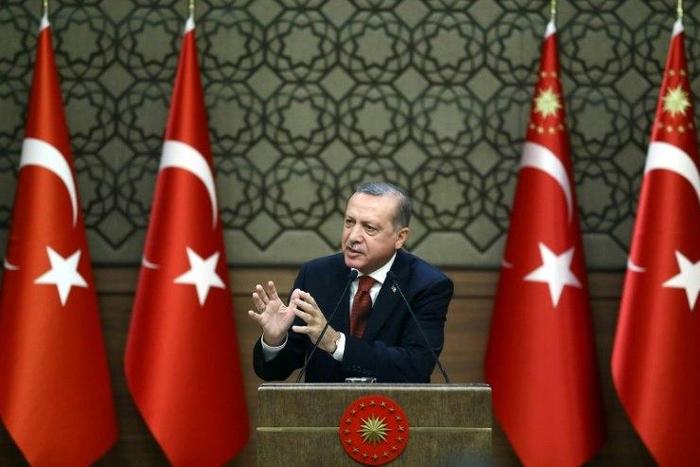 Turkish President Recep Tayyip Erdogan blamed a conspiracy to "bring Turkey to its knees" for the drop in the lira's value