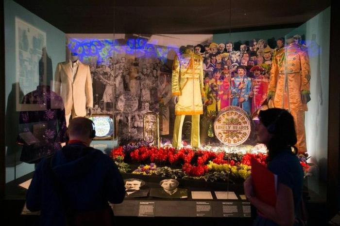 Original and replica costumes from The Beatles used on the album cover of Sgt. Pepper's Lonely Hearts Club Band are displayed at the V&A museum in London