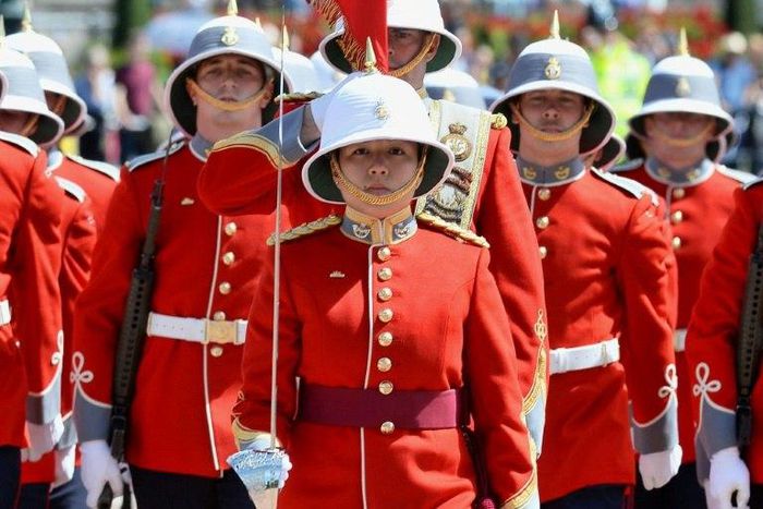 All change at the Guard: Captain Megan Couto has become the first female officer to command the elite troops protecting the queen at Buckingham Palace