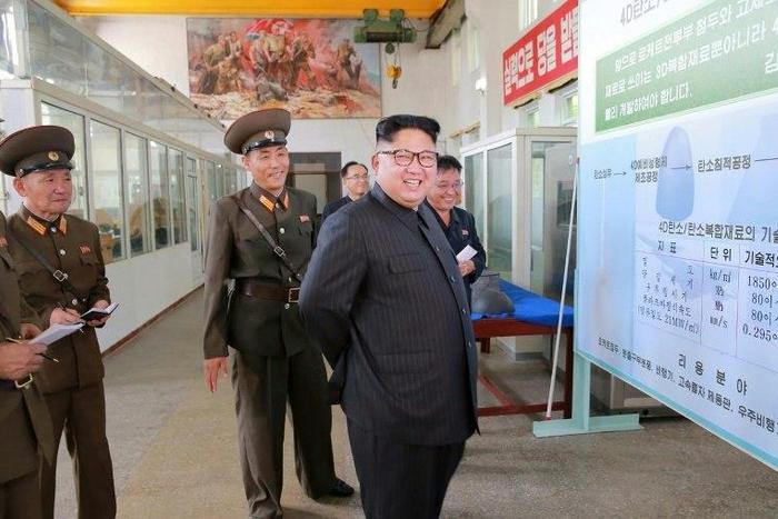 This undated picture released by North Korea's official Korean Central News Agency shows leader Kim Jong-Un visiting the Chemical Material Institute of the Academy of Defense Science