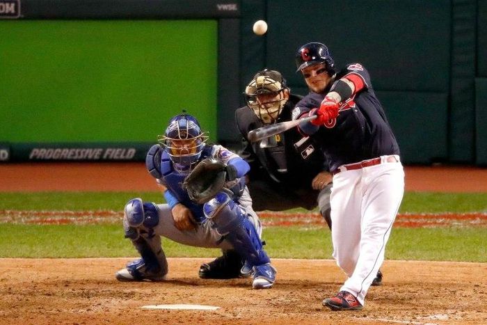Roberto Perez of the Cleveland Indians hits a three-run home run during the eighth inning against the Chicago Cubs in Game One of the 2016 World Series
