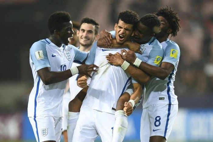 England forward Dominic Solanke celebrates a goal with teammates in the U-20 World Cup semi-final against Italy in Jeonju, South Korea, on June 8, 2017