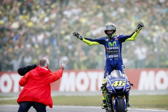 Italy's Valentino Rossi celebrates after winning the Dutch Motorcycling Grand Prix at the TT circuit in Assen on June 25, 2017