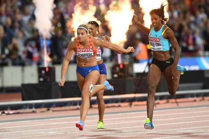 Netherlands' Dafne Schippers wins the final of the women's 200m athletics event at the 2017 IAAF World Championships at the London Stadium in London on August 11, 2017