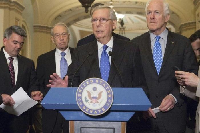 US Senate Majority Leader Republican Mitch McConnell (C) and company forged ahead to change court confirmation rules despite concerns, infuriated by Democrats' insistence on filibustering what Republicans consider a mainstream Supreme Court nominee