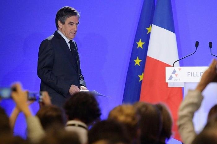 French presidential candidate Francois Fillon announced Wednesday that judges had summoned him to press charges over an expenses scandal but said he would continue his campaign