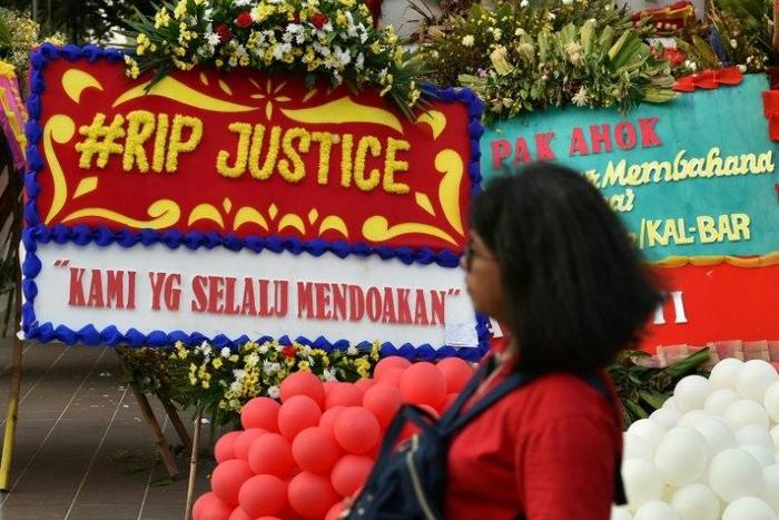 Basuki Tjahaja Purnama was jailed Tuesday for two years after being found guilty of blasphemy against Islam, a shock decision after prosecutors recommended only probation