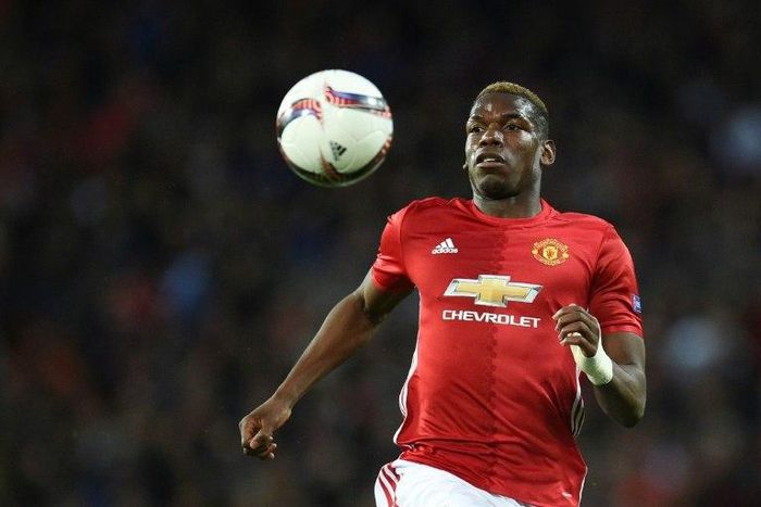 Manchester United's French midfielder Paul Pogba chases the ball during the UEFA Europa League quarter-final match between Manchester United and Anderlecht at Old Trafford in Manchester on April 20, 2017