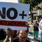 A Venezuelan activist chants slogans against President Nicolas Maduro during an opposition rally in Caracas, on March 31, 2017