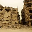The refugee's wife and child are still living in war-wracked Aleppo