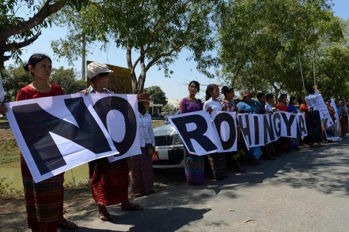 Anti-Rohingya protesters rally at Yangon's Thilawa port as the Malaysian ship carrying relief aid for Rohingya Muslims arrives on February 9, 2017