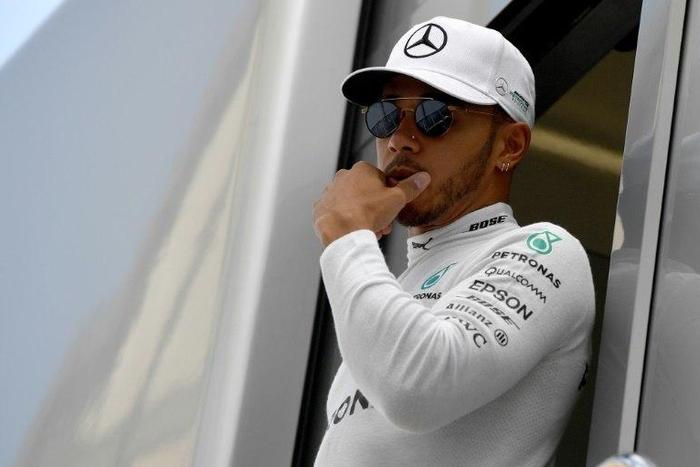 Mercedes' British driver Lewis Hamilton prepares to take part in a practice session in Budapest on July 28, 2017