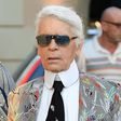 Karl Lagerfeld pictured wearing an unusual vibrant jacket