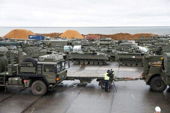 British tanks and military vehicles are unloaded at the port Estonian of Paldiski on March 22, 2017