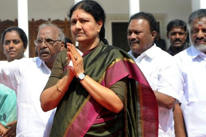 VK Sasikala (centre), general secretary of Tamil Nadu state's ruling AIADMK, was ordered to surrender to prison authorities after judges quashed her acquittal in a $10 million "disproportionate assets" case