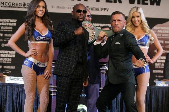 Floyd Mayweather and Connor Mcgregor pose during a media press conference in Las Vegas, Nevada