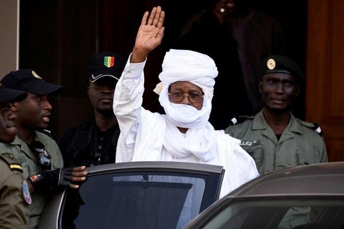 Former Chadian dictator Hissene Habre leaves a Dakar courthouse after an identity hearing in June 2015