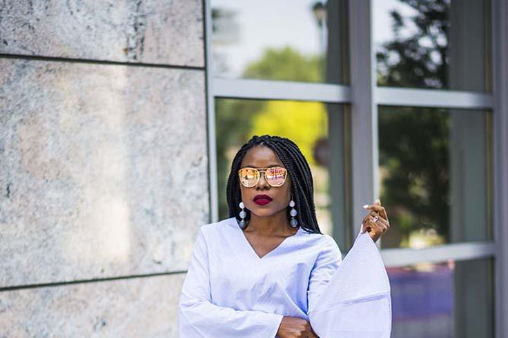 Titilola Sogunro does a chic detailed shirt over denim