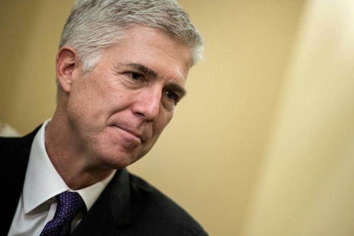 US Supreme Court nominee Neil Gorsuch waits for a meeting on Capitol Hill, on February 13, 2017