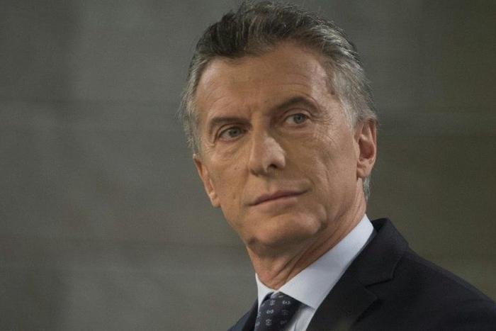 Argentinian President Mauricio Macri speaks during a joint press conference with Spanish Prime Minister at Moncloa Palace in Madrid on February 23, 2017