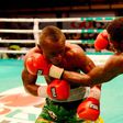 Raphael Kwabena (in green shorts) and Olaide Fijabi (in black and white shorts) slugging it out in the ring on October 2, 2016