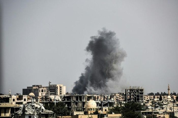 Smoke billows following an airstrike on the western frontline of Raqa on July 17, 2017