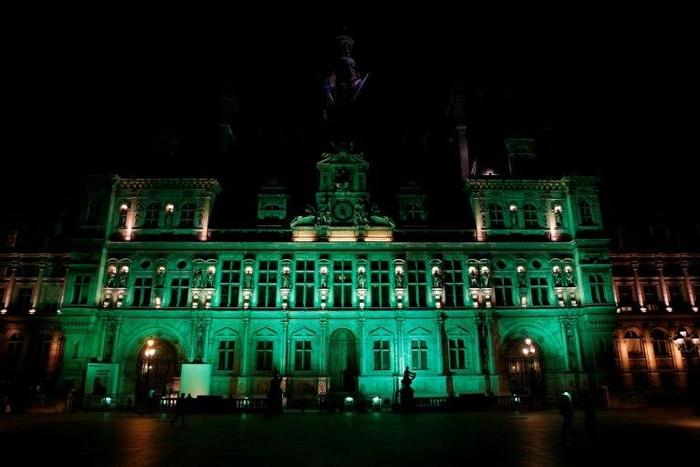 The City Hall of Paris illuminated in green following the announcement by US President Donald Trump that the United States will withdraw from the 2015 Paris accord