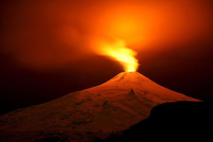 The Villarrica Volcano is seen at night from Pucon town, Chile, July 11, 2015.    REUTERS/Cristobal Saavedra