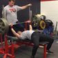 132-Pound Woman Bench Presses.