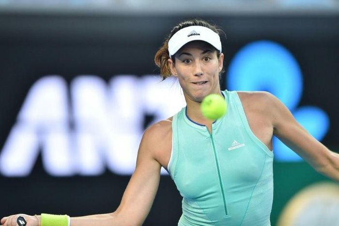 Spain's Garbine Muguruza hits a return against Romania's Sorana Cirstea during their women's singles match at the Australian Open in Melbourne on January 22, 2017
