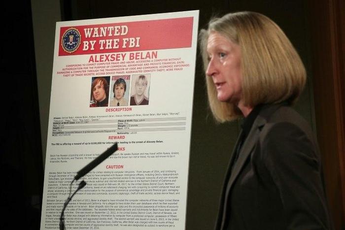 The US Justice Department indicted two officials of Russia's Federal Security Service, the FSB, and two hackers they hired to steal data from Yahoo user accounts