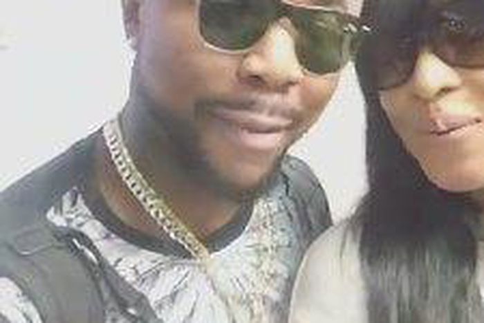 Oritsefemi and his wife at the airport