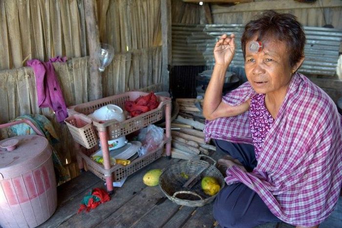 Chhum Long's daughter was paid $10,000 to be a surrogate mother, a sum worth nearly a decade of average income in Cambodia