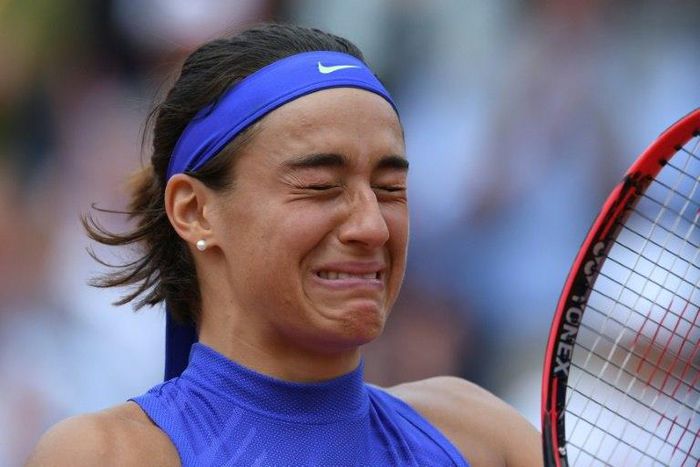 France's Caroline Garcia celebrates beating Su-Wei Hsieh at Roland Garros on June 3, 2017 in Paris