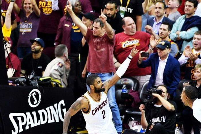Kyrie Irving celebrates the Cleveland Cavaliers 112-99 win over the Boston Celtics at the Quicken Loans Arena in Cleveland, Ohio