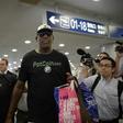 Former NBA player Dennis Rodman arrives to check-in for his flight to North Korea, at Beijing's international airport, on June 13, 2017