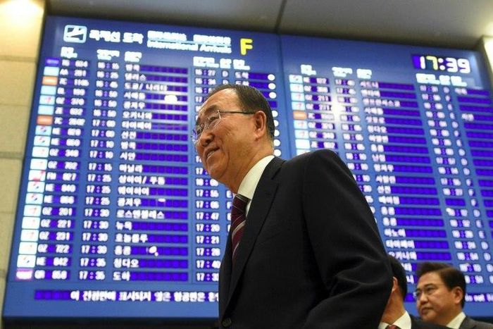 Former UN secretary-general Ban Ki-moon (C) arrives at the Incheon International Airport, west of Seoul, on January 12, 2017