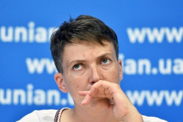 Ukrainian pilot Nadiya Savchenko looks on during a press-conference in Kiev on August 2, 2016