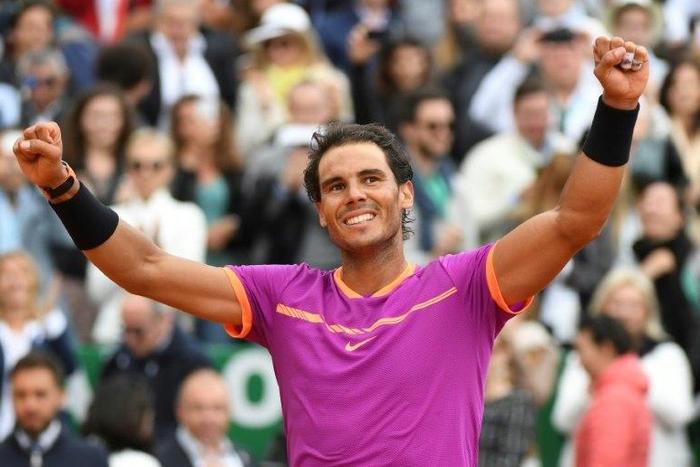 Spain's Rafael Nadal celebrates after beating compatriot Albert Ramos-Vinolas to clinch his 10th Monte Carlo Masters title in Monaco, on April 23, 2017