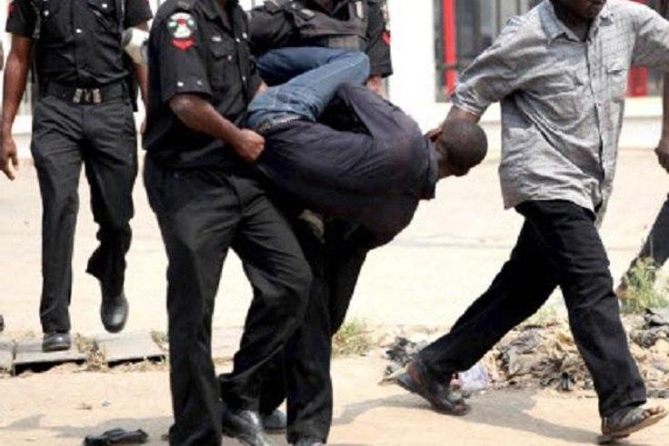 The police arresting a man (Illustration)