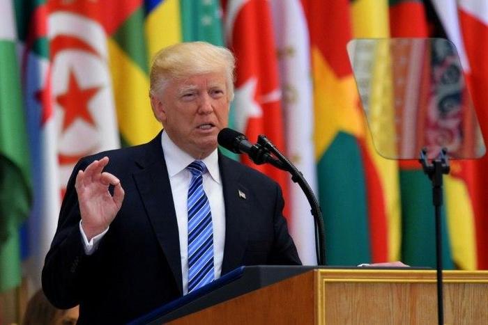 US President Donald Trump speaks at Arab Islamic American Summit in Riyadh on May 21, 2017, calling on all countries to work together to isolate Iran "until the Iranian regime is willing to be a partner for peace"