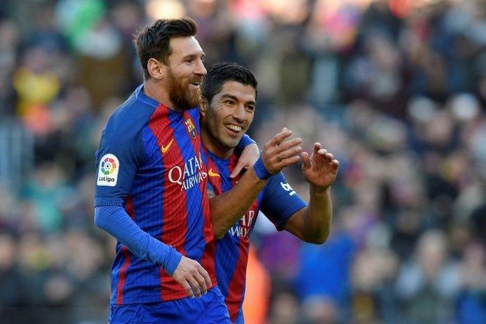 Barcelona's Luis Suarez celebrates with team-mate Lionel Messi after scoring against Las Palmas at the Camp Nou stadium in Barcelona on January 14, 2017