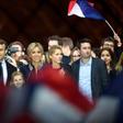 Emmanuel Macron with his wife Brigitte and members of her family at a victory party after his resounding win over far-right rival Marine Le Pen